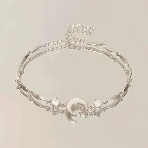 Жіночий рожевий браслет Ніжна Весна із намистинами, квітковою підвіскою та метеликом